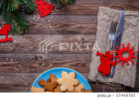 Table with cutlery decorated cookies 37449705