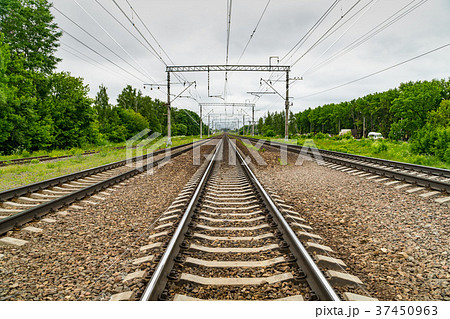 Train tracks go over the horizon line 37450963