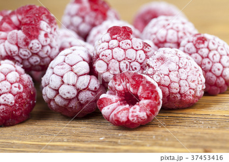 frozen raspberries, closeup 37453416