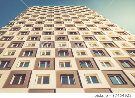 From below shot of modern apartment building. From below shot of modern apartment building. 37454925
