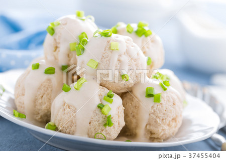 Chicken meatballs with white sauce 37455404