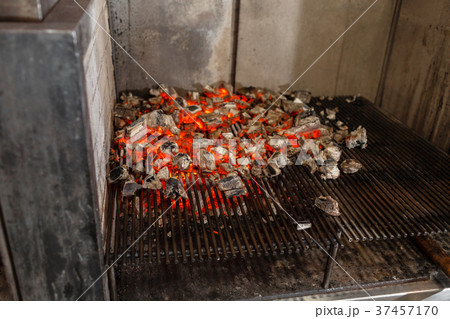 Typical Argentinian barbecue or asado. Burning Typical Argentinian barbecue or asado. Burning 37457170
