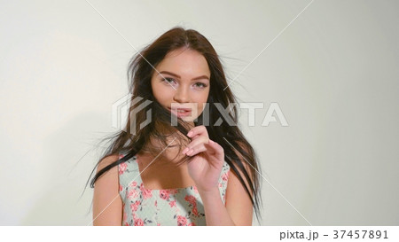 Portrait of beautiful young woman at studio on the Portrait of beautiful young woman at studio on the 37457891