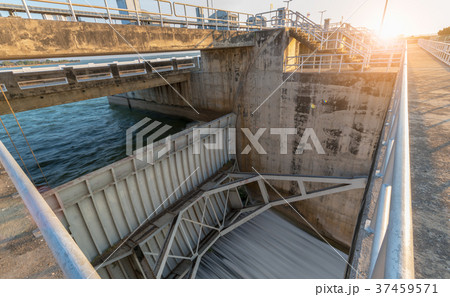 construction of Spillway Dam gate with sunrise, 37459571