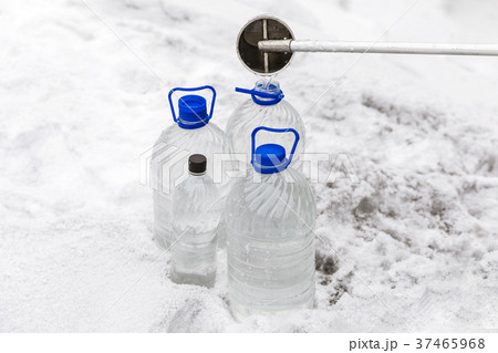 Man in special clothes collecting samples of water 37465968