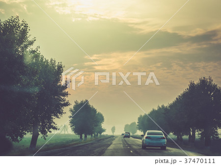 Early in the morning journey by car. Early in the morning journey by car. 37470111