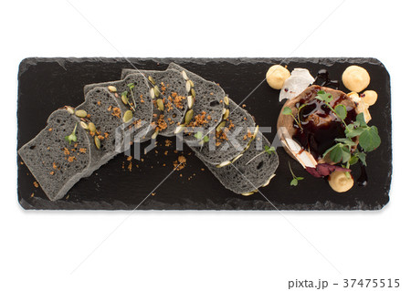Slices of black bread with dessert top view Slices of black bread with dessert top view 37475515