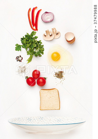 The falling ingredients of fried egg. Healthy The falling ingredients of fried egg. Healthy 37479988