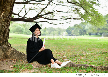 Graduation Concept. Graduated students on graduation day. Asian Graduation Concept. Graduated students on graduation day. Asian 37487097