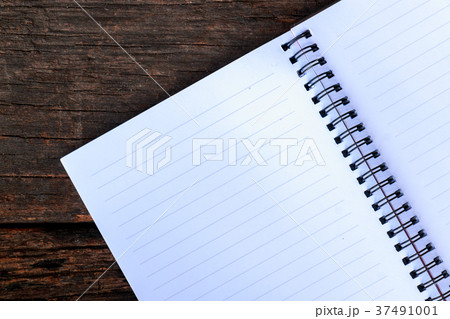 Blank paper notebook on brown wooden 37491001