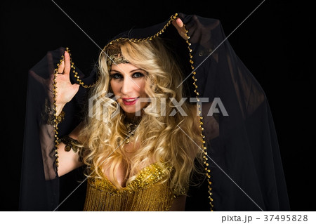 Woman fortune teller portrait at black 37495828