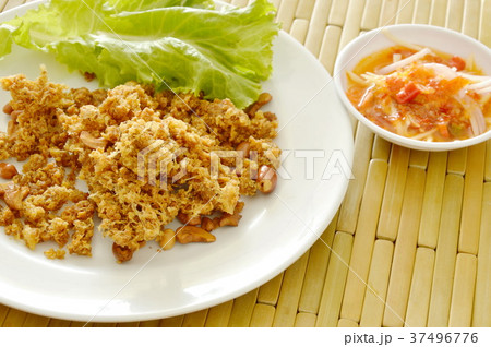 crispy fried minced catfish with green mango salad crispy fried minced catfish with green mango salad 37496776