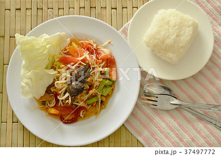 Somtum Thai spicy green papaya with black crab 37497772