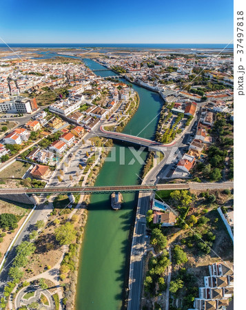 Vertical panorama of the bridges of city of Tavira 37497818