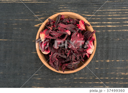Dry hibiscus tea in bowl Dry hibiscus tea in bowl 37499360