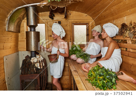 three girls relaxing in sauna 37502941