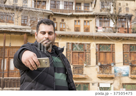 young man taking selfie in Masuleh village ancient 37505475