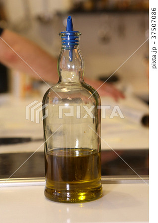 sonflower oil in half empty bottle 37507086