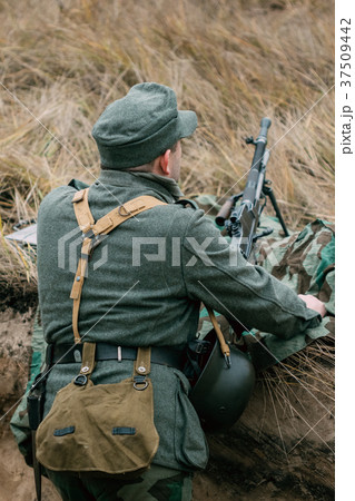 German soldier in the machine-gun position German soldier in the machine-gun position 37509442