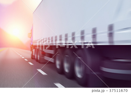 Semi-truck on a highway in sunset 37511670