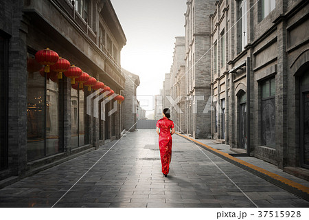 Asian young woman in Hutong, Beijing, China. Asian young woman in Hutong, Beijing, China. 37515928