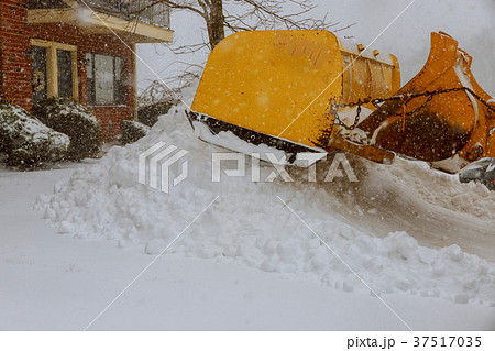Removing snow from a road in winter Removing snow from a road in winter 37517035