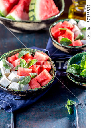 Watermelon cheese and mint salad with olive oil 37523337