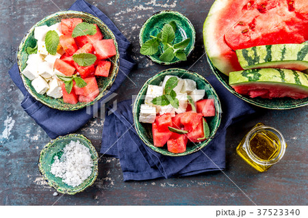 Watermelon cheese and mint salad with olive oil 37523340