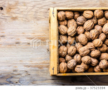 Box of walnuts. Harvest concept Box of walnuts. Harvest concept 37523394