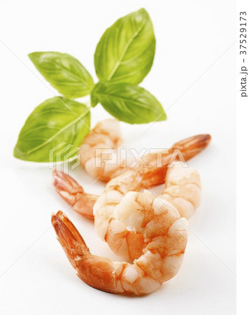 Four peeled prawns with basil Four peeled prawns with basil 37529173