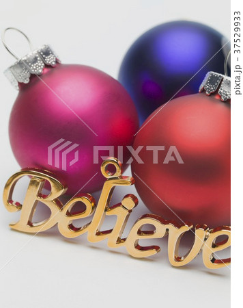 Coloured baubles and the word 'Believe' (tree ornaments) 37529933