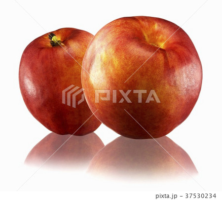 Two nectarines with reflection 37530234