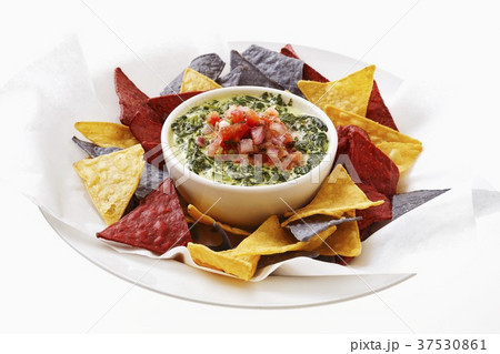 Spinach and Parmesan dip with tortilla chips 37530861