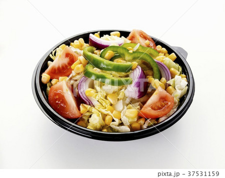 Mixed salad in a plastic container 37531159