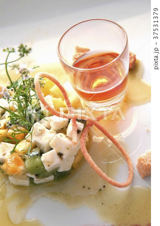 Fruit salad with goat's cheese, aperitif 37531379