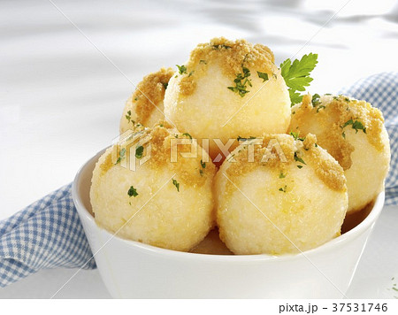 Potato dumplings with buttered breadcrumbs and parsley Potato dumplings with buttered breadcrumbs and parsley 37531746