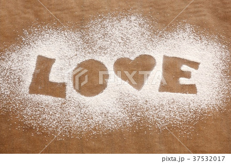 The word 'LOVE' in icing sugar 37532017