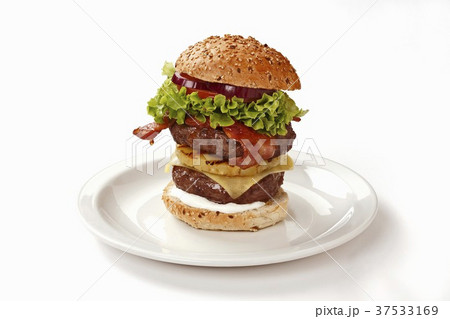 Double-decker burger with bacon and pineapple 37533169
