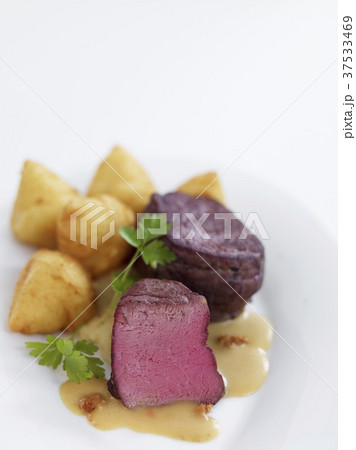 Medallions of venison with croquettes Medallions of venison with croquettes 37533469