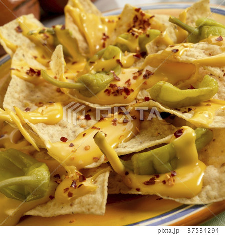 Nachos with Pepperoncinis and Cheese Sauce 37534294