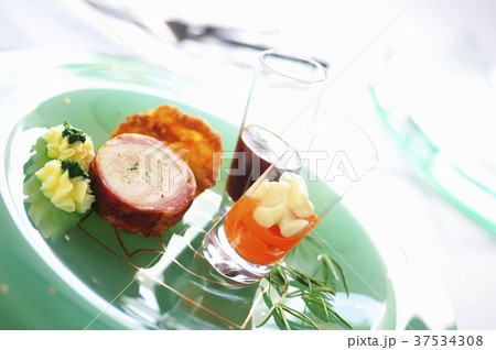 Poached chicken roulade with tamarind sauce Poached chicken roulade with tamarind sauce 37534308