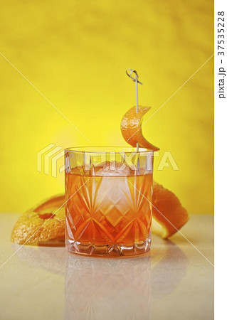 Unusual Negroni: a cocktail made with gin, Lillet Blanc and Aperol Unusual Negroni: a cocktail made with gin, Lillet Blanc and Aperol 37535228