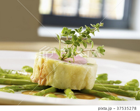 Pork fillet wrapped in brick dough with Thai green asparagus 37535278