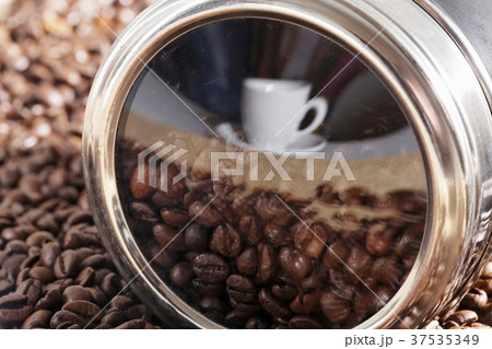A reflection of a coffee cup 37535349