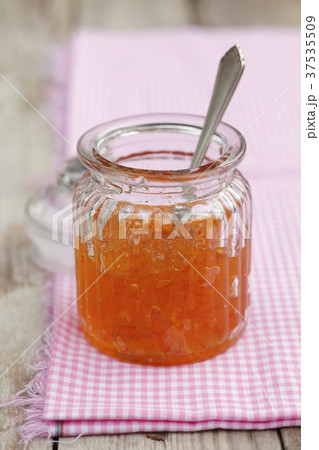 Orange marmalade in a jar 37535509