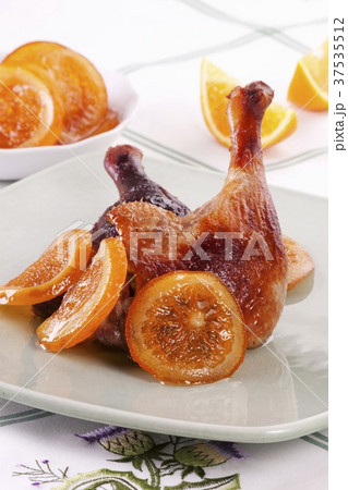 Roast duck leg with oranges 37535512