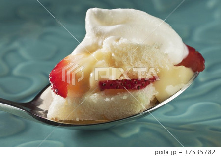 Pound Cake with Pudding Filling, Strawberries and Whipped Cream on a Spoon 37535782