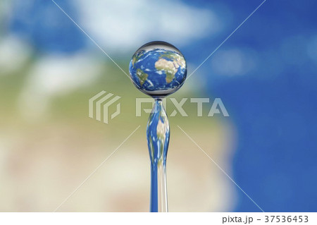 Globe in a water drop Globe in a water drop 37536453