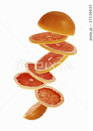 Sliced pink grapefruit Sliced pink grapefruit 37536635