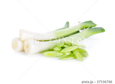 whole and sliced fresh leek on white background 37536786